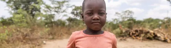 portrait of a child in a orange t-shirt