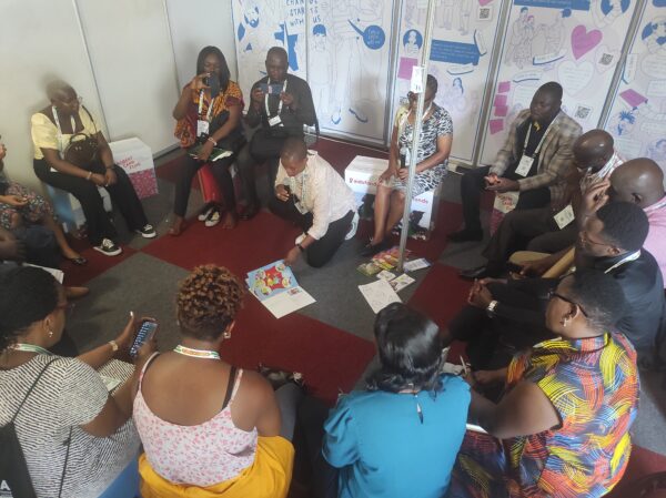 group of people in a workshop at ICASA2023 conference