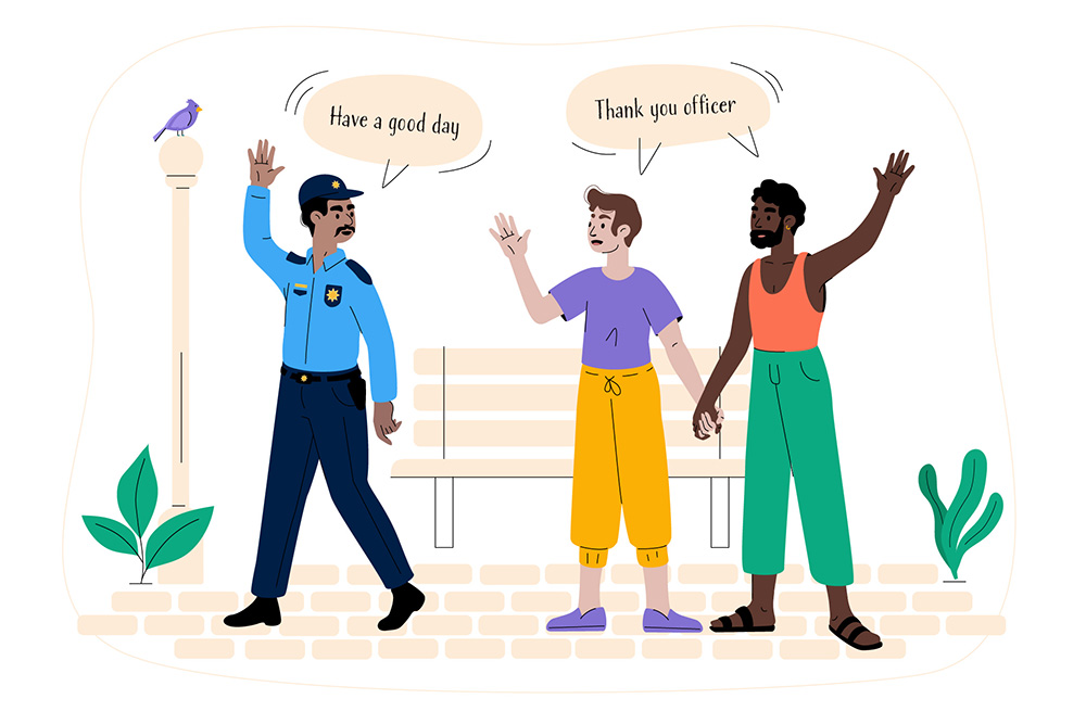 A police officer waves goodbye to two men standing by a bench; one man waves back while the other thanks the officer.